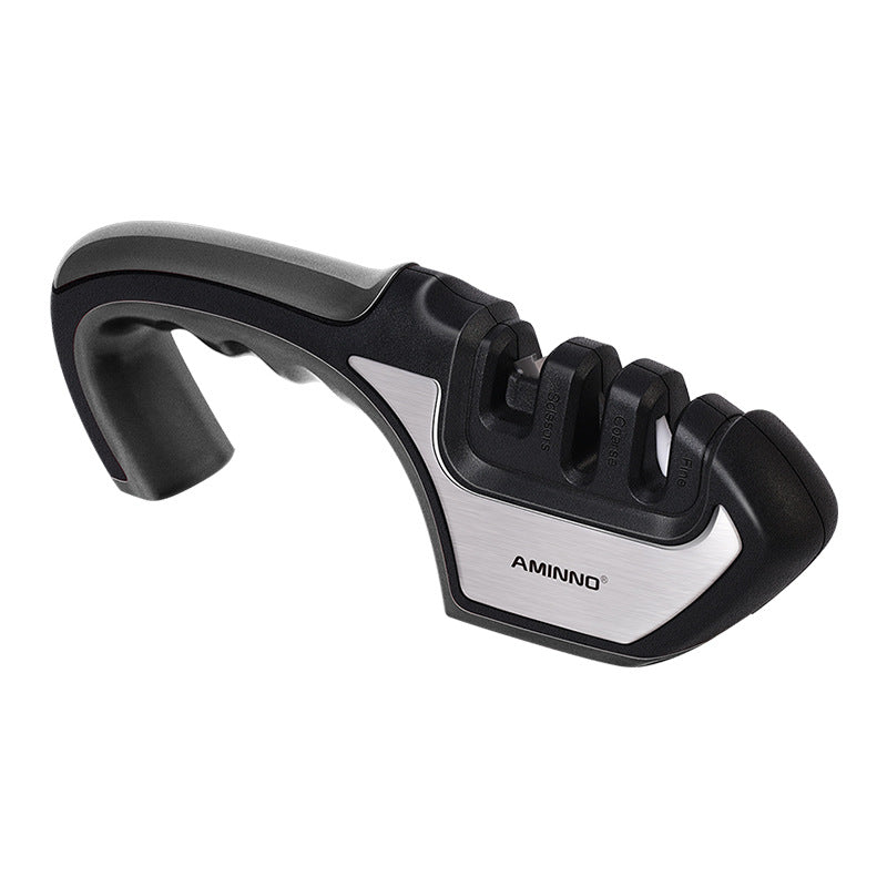 Uses A Sharpener To Sharpen A Kitchen Knife